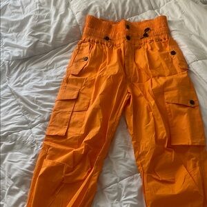 AKIRA Orange Cargo Pants